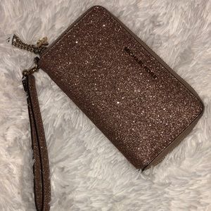 USED MICHAEL KORS ALEX TRAVEL WALLET